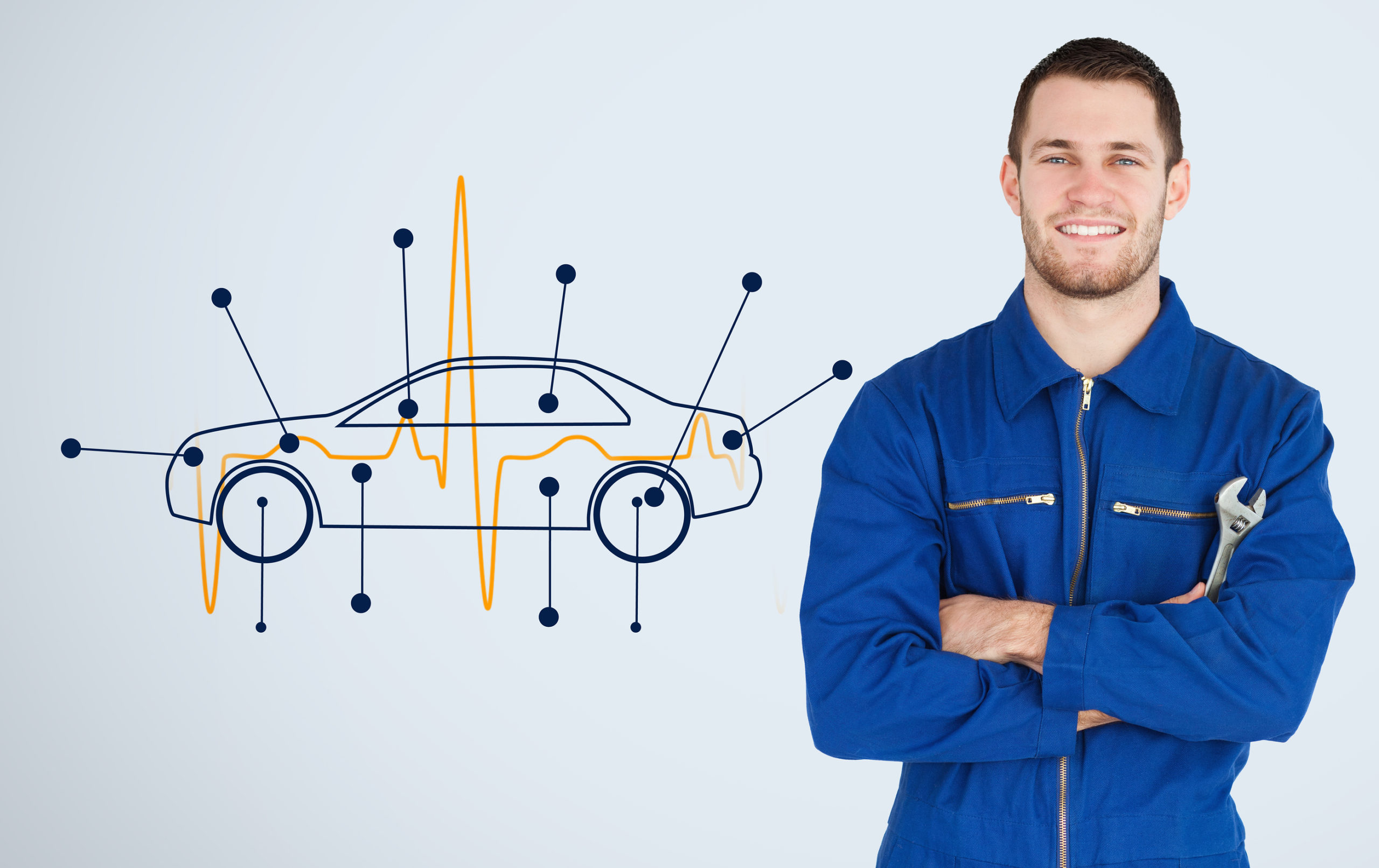Portrait of a young mechanic next to background with car diagram
